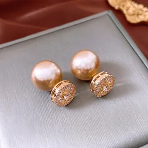 Elegant 14k gold plated silver needle stud earrings with zirconia and large pearls