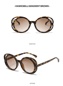 Detail view of oval tortoise sunglasses with gradient brown lenses in front and side views