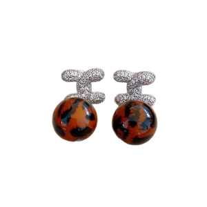 Chic silver earrings with C-shape crystal studs and leopard print round pendants