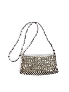 Close-up of hand-woven silver sequin beadwork and metallic grid pattern on crossbody bag