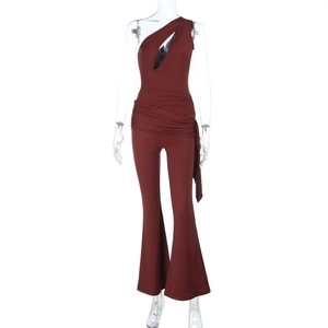 Detail of one-shoulder cut-out jumpsuit with draped waist pleats and wide legs