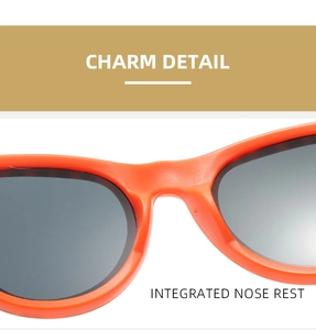 Detail view of integrated nose rest on bright orange plastic camouflage party glasses