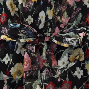 Floral embroidery midi dress in black with elegant waist bow detail and chiffon fabric