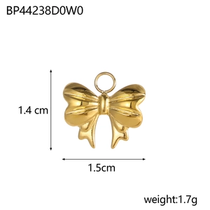 Detailed view of a golden bow pendant charm with dimensions 1.4x1.5cm and 1.7g weight