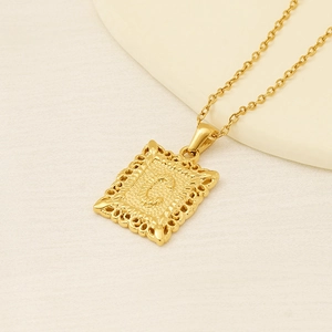 Gold square letter C pendant necklace with intricate镂空engraved edges and link chain