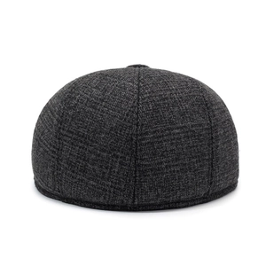 Men's winter flat cap in thick dark grey tweed with warm ear protection design