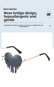 Detail of heart shaped melting lens sunglasses with sleek gold metal frames and nose pads
