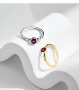 Detail view of S925 silver ring with red oval gemstone and hallmark engraving