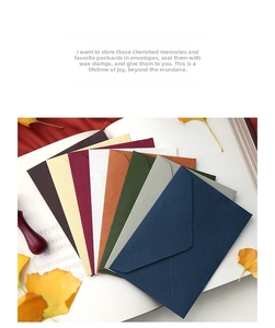 Close-up of assorted vintage linen textured envelopes with classic V-flap design