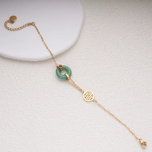 Bracelet rétro en acier inoxydable doré avec anneau jade et pendentif caractère Fu