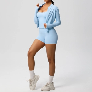 Three-piece light blue yoga set with zipper jacket, tank top and high waist shorts