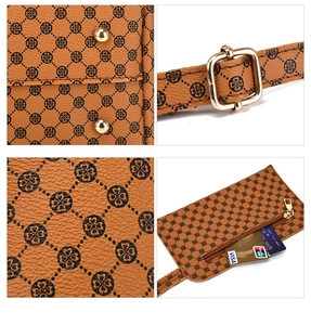 Detail of brown leather tote featuring clover print, gold studs, and square buckle hardware