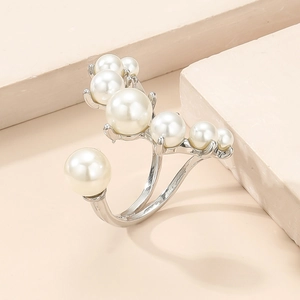 French vintage style open ring with multiple white pearls in a polished silver finish