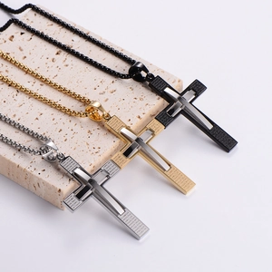 Vintage stainless steel cross necklace with engraved scriptures in silver, gold, and black