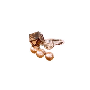 French retro open ring with square stone zircon and pearls on a white background