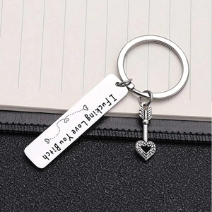 Polished stainless steel keychain with I F**king Love You Bitch engraving and heart charm