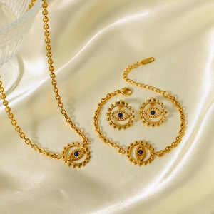 Parure bijoux en acier plaqué or 18K avec pendentifs œil d'ange sur tissu en soie