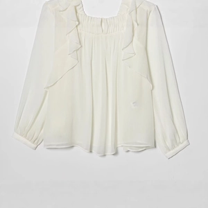Elegant white long sleeve chiffon shirt with ruffle trim layers on a clean background