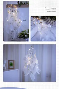 White feather dreamcatcher with warm LED lights and colorful beads detail view