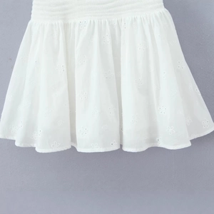 White French style mini dress with delicate floral embroidery and button detail