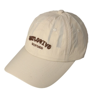 Beige quick-dry baseball cap featuring 3D brown 'EXPLOSIVE EXISTENCE' embroidery
