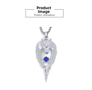 Detailed close-up of a silver wolf head pendant with a square blue gemstone and box chain