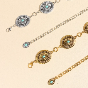 Bohemian carved metal waist chains with turquoise concho details in gold and silver