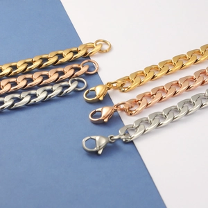 Detailed view of Cuban link chains in gold, rose gold and silver with lobster clasps
