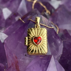 Vintage gold locket necklace with red heart zircon on amethyst crystal base