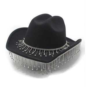 Detail of black cowboy hat featuring elegant silver rhinestone fringe and a teardrop gem