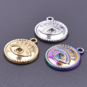 Three evil eye stainless steel pendants in gold, silver, and rainbow color finishes