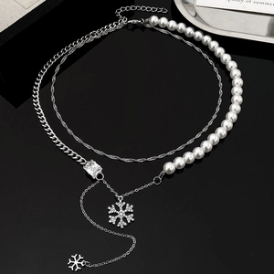 Double-layer necklace with silver chain, white pearls and blue snowflake pendants