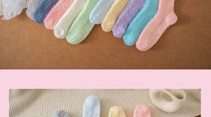 Detail showing non-slip silicone grippers on warm macaron-colored fluffy coral fleece socks