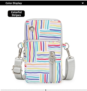 Detail view of colorful striped oxford phone bag with heart-shaped metal zipper puller