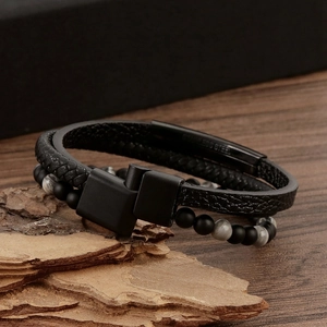 Detail of multi-layer leather bracelet with natural stone beads and magnetic steel clasp