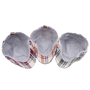 Detailed top view of colorful cotton plaid ivy caps with breathable lining and care labels