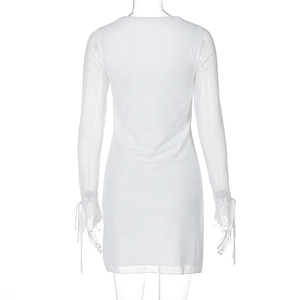 Detail of white mesh dress back with adjustable drawstring cuffs and sheer texture