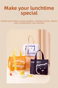Three colorful cartoon thermal lunch bags with bear prints shown in a lifestyle scene