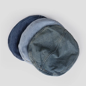 Retro denim beret caps in three shades of blue with contrast stitching and washed texture
