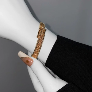 Luxury gold layered spiral open cuff bracelet with metallic beads for stylish women