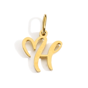 Detailed view of a golden letter H charm pendant made of polished stainless steel