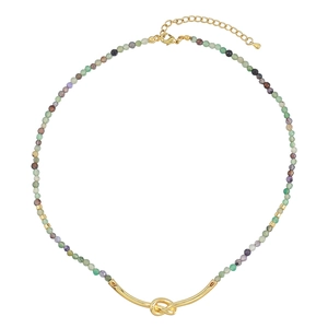 Bohemian colorful natural stone and glass bead necklace with a gold knot pendant