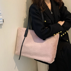 Pink plush tote bag for women with black straps, stylish winter shoulder bag crossbody