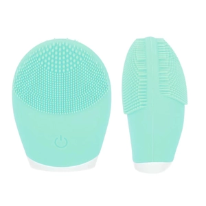 Detail view of mint green silicone facial cleanser with soft bristles and power switch