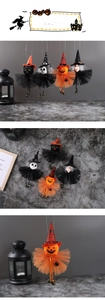 Detailed view of Halloween plush hanging ornaments with mesh skirts and bells