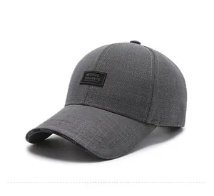 Detail of grey baseball cap showing textured fabric and Archive Distance square patch