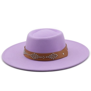 Close-up of lavender wool felt fedora with brown leather band and silver floral rivets