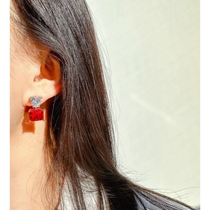 Elegant red square stone earrings with heart zircon, featured on model for a 2024 look