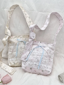 Sweet floral tulle shoulder bag with lace trim and blue ribbon bow in soft pastel colors