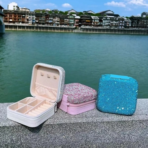Detailed view of portable jewelry boxes with glitter diamond finish and mirror